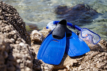 mask, snorkel and fins for snorkeling at the beach