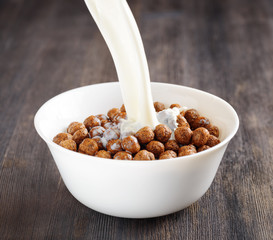 Bowl of chocolate cereal on a table