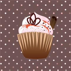 cupcake on the brown  background with cinnamon