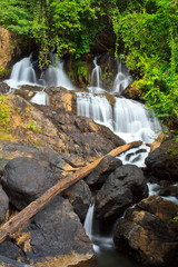Naklejka na ściany i meble Pha Sue waterfall in Mae Hong Son province of Thailand