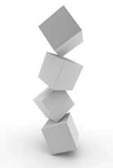 selection of cubes balancing on top of one another