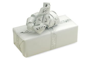 little white gift package with ribbon  on pure white background