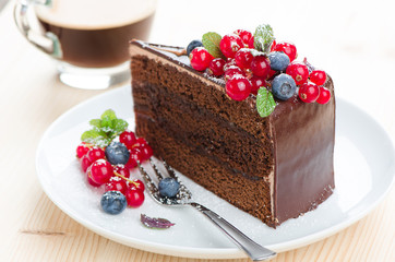 cake on a plate with berries