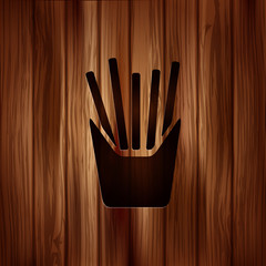 Fried potatoes icon. Wooden background.
