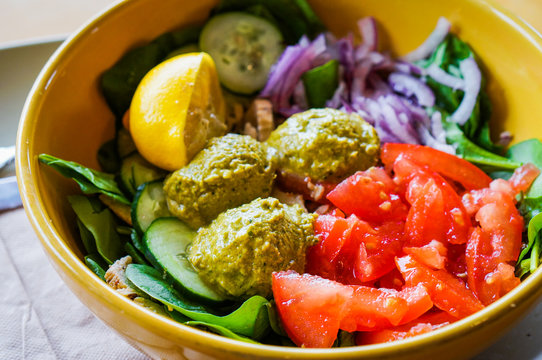 Protein salad with vegetables and hummus