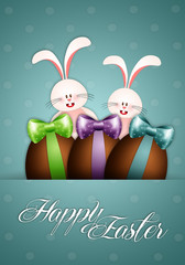 Rabbits with chocolate eggs for Easter