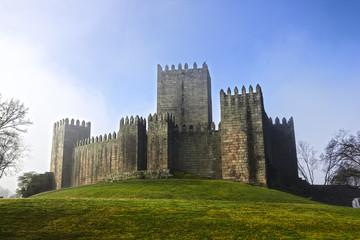 Fototapeta na wymiar Guimaraes castle and surrounding park, Portugal