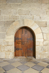 Fototapeta na wymiar wooden door at castle in Guimaraes, Portugal