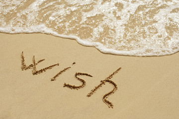 Fototapeta premium Conceptual text sand on beach