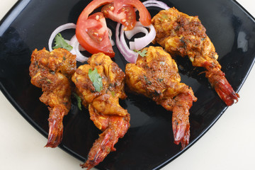 Tawa Prawn – Goan dish made of prawns skewered and cooked on taw