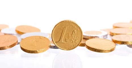Euro currency, chocolate coins isolated on white