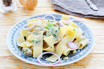 nutritious pasta with slices of mushrooms