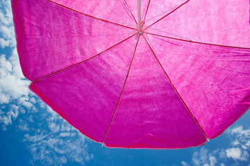 beach umrella with blue sky