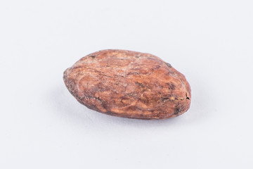 Naklejka premium Chocolate cocoa beans isolated on white background