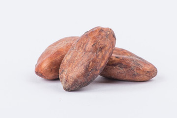 Obraz premium Chocolate cocoa beans isolated on white background