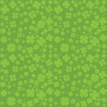 Green background with four leaf clovers, St. Patrick's Day backg