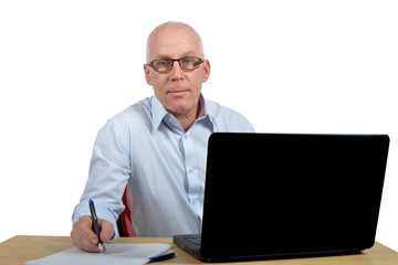 Senior businessman in office