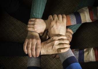 Many hands together