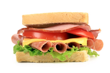 Sandwich with bacon and vegetables.