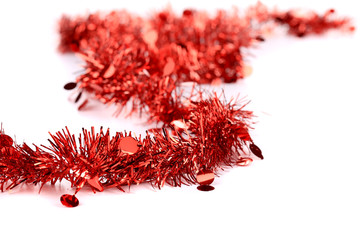Christmas red tinsel with stars.