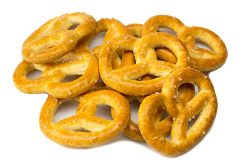salted pretzels on white background