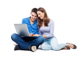 Young couple with laptop computer