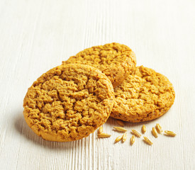Oatmeal cookies on wooden table