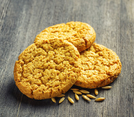 Oatmeal cookies on wooden table