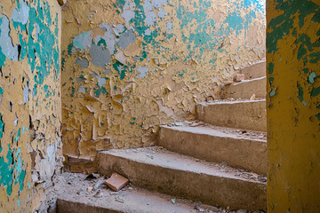 Staircase in an abandoned and forgotten building