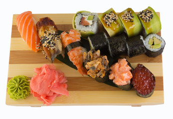 Sushi roll on a plate isolated on white background