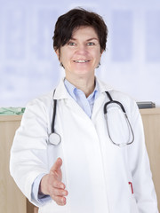 Doctor goes hand on arrival