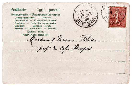 old handwritten postcard letter with stamp and text