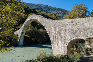 Fototapeta na wymiar The historical Plaka bridge in Epirus, Greece