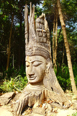 Wooden statue of Buddha.