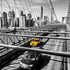 Taxi cab crossing the Brooklyn Bridge in New York