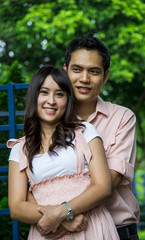 Naklejka premium Lover couple hug in the garden2