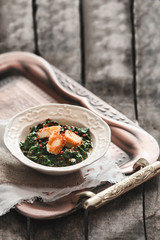 Plate of spinach and cheese curry Saag Paneer - Stock Image