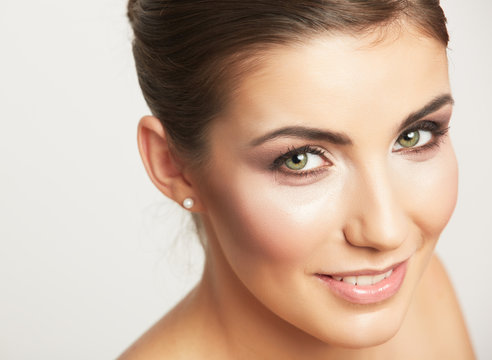 Close up portrait of beautiful young woman face.
