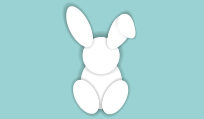 White paper bunny on blue background