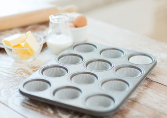 Fototapeta na wymiar close up of empty muffins molds