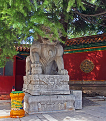 Obraz premium Stone Qilin statue at Lama temple, Beijing