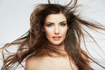 Fototapeta premium Woman face with hair motion on white background isolated