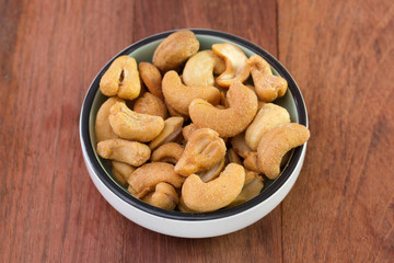 salted cashew with pepper in bowl