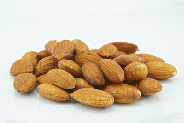 Crispy almond isolated on white background