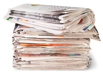 Stack Of Newspapers And The Roll
