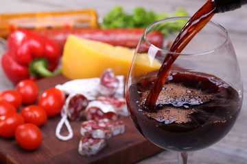 Pouring red wine and food bachground - 61725165
