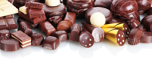 Many different chocolate candy isolated on white