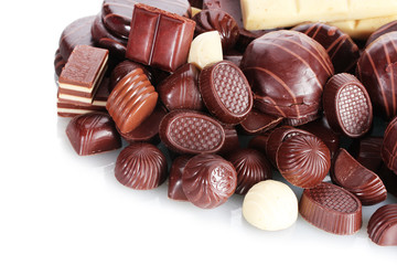 Many different chocolate candy isolated on white