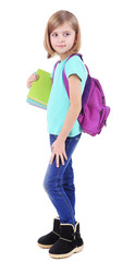Beautiful little girl with backpack holding books isolated