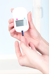 Measuring glucose level blood close-up